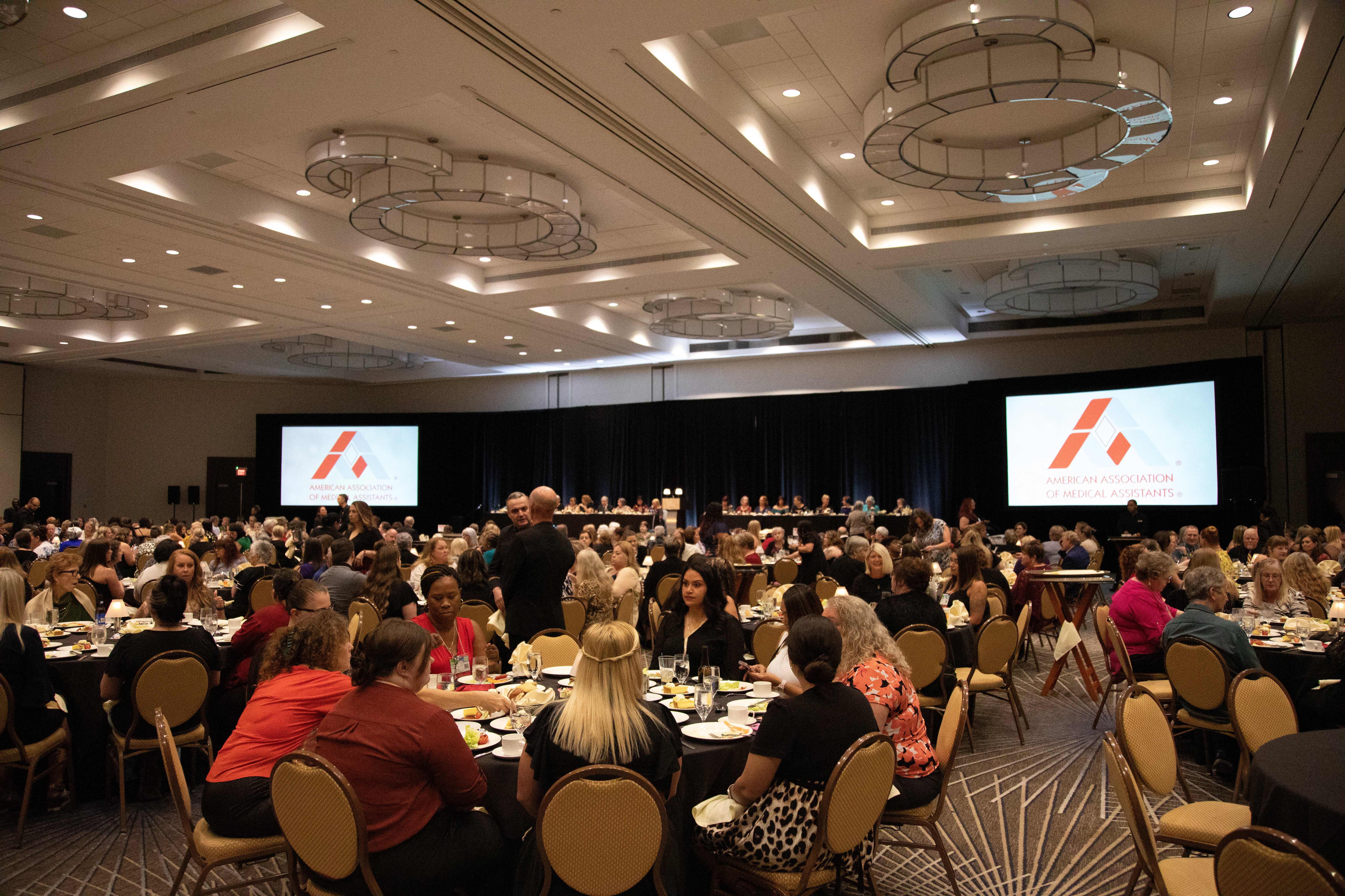 Luncheon photo of tables at conference.